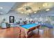 Relaxing recreation room with pool table and comfortable seating at 107 Seahorse Se Dr # A, St Petersburg, FL 33705