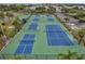 Community tennis courts with well-maintained surfaces at 107 Seahorse Se Dr # A, St Petersburg, FL 33705