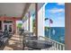 Relaxing waterfront patio with outdoor seating and stunning water views at 107 Seahorse Se Dr # A, St Petersburg, FL 33705