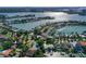 Aerial view of a house on the water, showcasing a beautiful waterfront community at 1200 80Th S St, St Petersburg, FL 33707