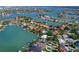 Aerial view showing waterfront home with access to canals and beautiful scenery at 1200 80Th S St, St Petersburg, FL 33707