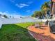 Private backyard with patio furniture and grill at 1200 80Th S St, St Petersburg, FL 33707