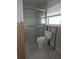 A partially renovated bathroom with a new toilet and shower at 1200 80Th S St, St Petersburg, FL 33707