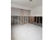 A gutted bedroom in need of renovation, showing exposed walls and flooring at 1200 80Th S St, St Petersburg, FL 33707
