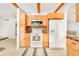 Kitchen with wood cabinets, granite counters, and stainless steel appliances at 1200 80Th S St, St Petersburg, FL 33707