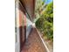 Brick walkway leading to the back of the house at 1200 80Th S St, St Petersburg, FL 33707