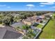 Aerial view of houses with pools in a community setting at 12308 Adventure Dr, Riverview, FL 33579