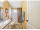 Clean bathroom with shower/tub combo and updated vanity at 12308 Adventure Dr, Riverview, FL 33579