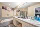Double vanity bathroom with a large soaking tub at 12308 Adventure Dr, Riverview, FL 33579
