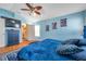 Spacious bedroom with a large bed and ceiling fan at 12308 Adventure Dr, Riverview, FL 33579