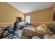 Bedroom with a bed, gaming setup and musical instruments at 12308 Adventure Dr, Riverview, FL 33579