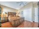 Spacious bedroom with wood floors and large closet at 12308 Adventure Dr, Riverview, FL 33579