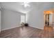 Empty bedroom with wood floors and a window at 12308 Adventure Dr, Riverview, FL 33579
