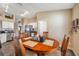 Eat-in kitchen dining area with wood table and four chairs at 12308 Adventure Dr, Riverview, FL 33579