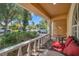 Charming front porch with seating area and view of the neighborhood at 12308 Adventure Dr, Riverview, FL 33579