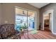 Bright Gathering room showcasing pool view, fireplace and access to backyard at 12308 Adventure Dr, Riverview, FL 33579