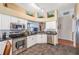 Bright kitchen with stainless steel appliances and an eat-in area at 12308 Adventure Dr, Riverview, FL 33579