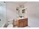 Small bathroom with single vanity and toilet at 15406 Peach Stone Pl, Ruskin, FL 33573