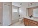 Bathroom includes a tub shower combo, toilet and vanity at 15406 Peach Stone Pl, Ruskin, FL 33573