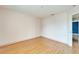 Spacious bedroom with light walls and wood flooring at 15406 Peach Stone Pl, Ruskin, FL 33573