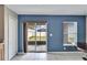 View of backyard from dining area with sliding doors at 15406 Peach Stone Pl, Ruskin, FL 33573