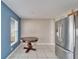 Dining area with a round table and view to backyard at 15406 Peach Stone Pl, Ruskin, FL 33573