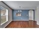 Bright dining area with hardwood floors and a view to kitchen at 15406 Peach Stone Pl, Ruskin, FL 33573