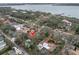 An aerial view showcasing a house's waterfront location and neighborhood context at 1545 Park N St, St Petersburg, FL 33710