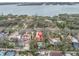 Aerial view of a home with a pool, located near the water at 1545 Park N St, St Petersburg, FL 33710