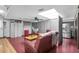 Finished basement recreation room with comfortable seating and a large screen TV at 1545 Park N St, St Petersburg, FL 33710
