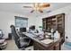 Spacious home office with large desk and built-in shelving at 1545 Park N St, St Petersburg, FL 33710