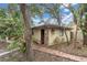 Detached storage building with brick base and path at 1545 Park N St, St Petersburg, FL 33710