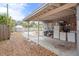 Fenced backyard with covered patio, laundry, and ample space at 1642 49Th N Ave, St Petersburg, FL 33714