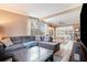 Living room boasts an open floor plan and a comfortable sectional sofa at 1642 49Th N Ave, St Petersburg, FL 33714