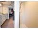 Clean bathroom with shower stall and updated vanity with granite countertop at 1673 Nash Ct, Dunedin, FL 34698