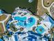 Aerial view of a community pool and surrounding amenities at 19381 Ship Wheel Way, Land O Lakes, FL 34638