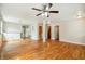 Bright living room with hardwood floors and ceiling fan at 2314 E 12Th Ave, Tampa, FL 33605