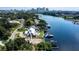 Waterfront lot with a view of the city skyline and neighboring houses at 2414 N Riverside Dr, Tampa, FL 33602