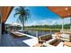 Relaxing waterfront patio with outdoor furniture, perfect for entertaining at 2414 N Riverside Dr, Tampa, FL 33602
