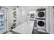 Convenient laundry room with washer, dryer, and ample storage at 246 43Rd Ne Ave, St Petersburg, FL 33703