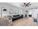 Spacious living room with light walls and a barn door at 246 43Rd Ne Ave, St Petersburg, FL 33703