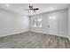 Living room with wood-look floors and neutral walls at 3206 E 38Th Ave, Tampa, FL 33610