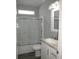 Clean bathroom with a tub shower combo and white vanity at 3737 Yardarm Dr, Tampa, FL 33611