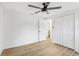 Light and airy bedroom featuring wood floors and a ceiling fan at 4215 E Paris St, Tampa, FL 33610