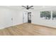 Bright living room with light wood floors at 4215 E Paris St, Tampa, FL 33610