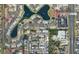 Aerial view of condo community showing location and nearby businesses at 4343 Tahitian Gardens Cir # G, Holiday, FL 34691