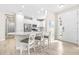 Modern kitchen with stainless steel appliances and white cabinets at 4639 Garofalo Rd, Wesley Chapel, FL 33543