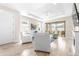 Bright and spacious living room with tile floors and access to a patio at 4639 Garofalo Rd, Wesley Chapel, FL 33543