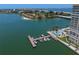 Aerial view showing boat docks, pool, and building at 5220 Brittany S Dr # 201, St Petersburg, FL 33715