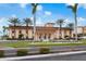 Community center with palm trees and landscaping at 5220 Brittany S Dr # 201, St Petersburg, FL 33715